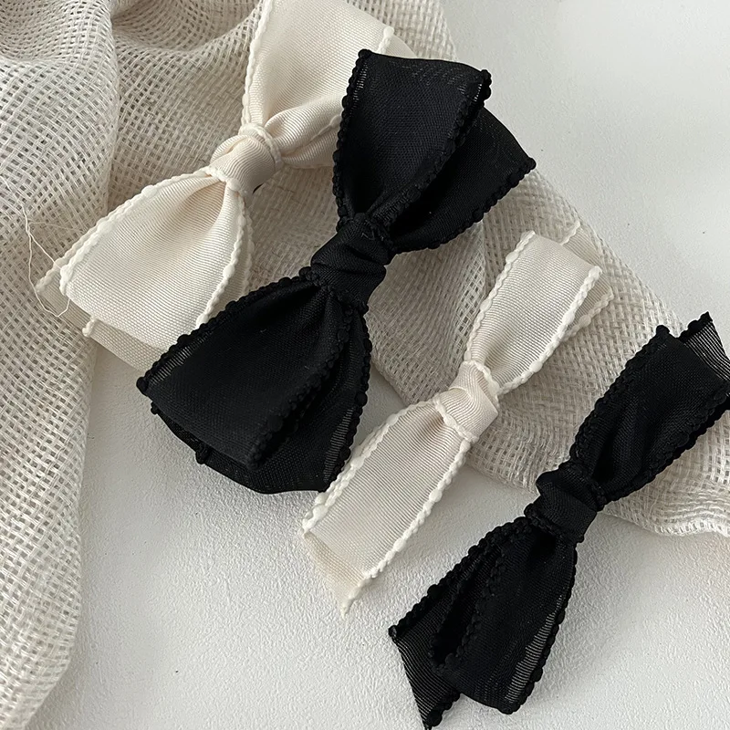 Korean version of the soft texture cream beige classic black cute texture bow duckbill clip spring clip hairpin hair accessories