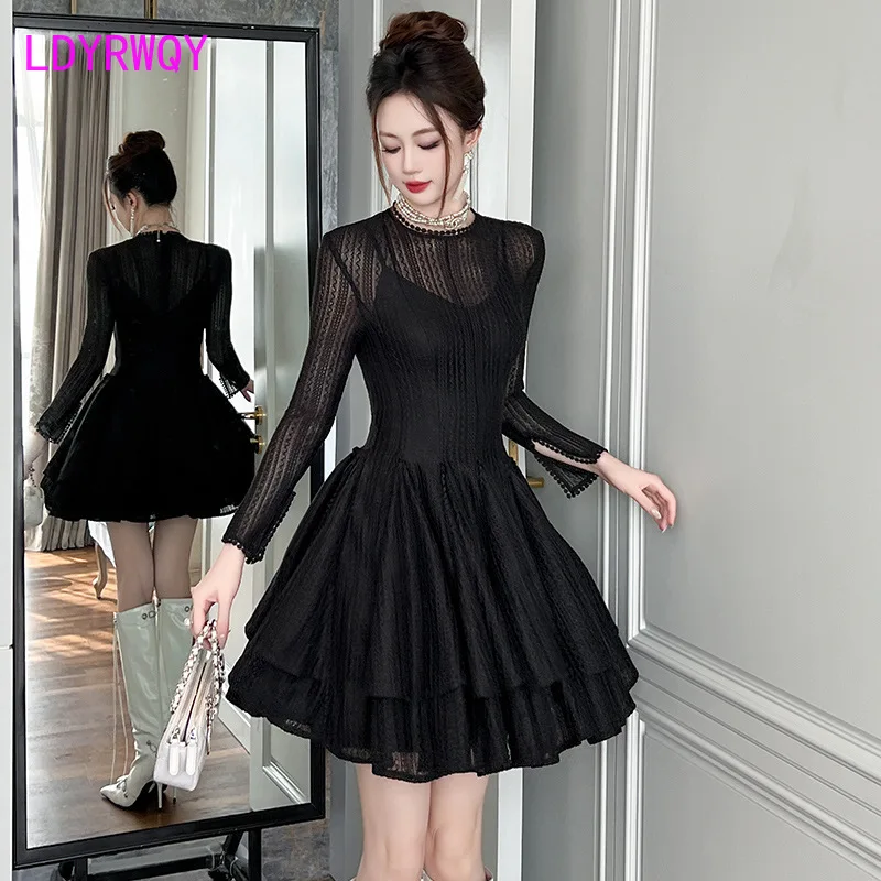 French retro Hepburn style waist cinching high hollow out dress for women in autumn and winter, slimming black puffy skirt