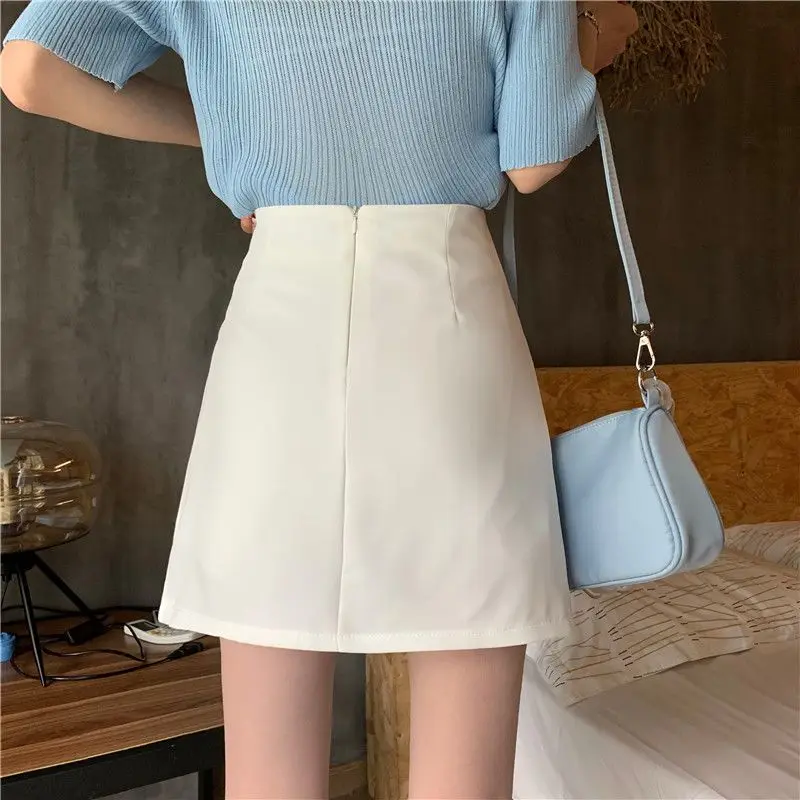 Fashion Zipper Solid Color Asymmetrical Pleated Short Skirts Women\'s Clothing 2024 Summer New Loose All-match Irregular Skirts