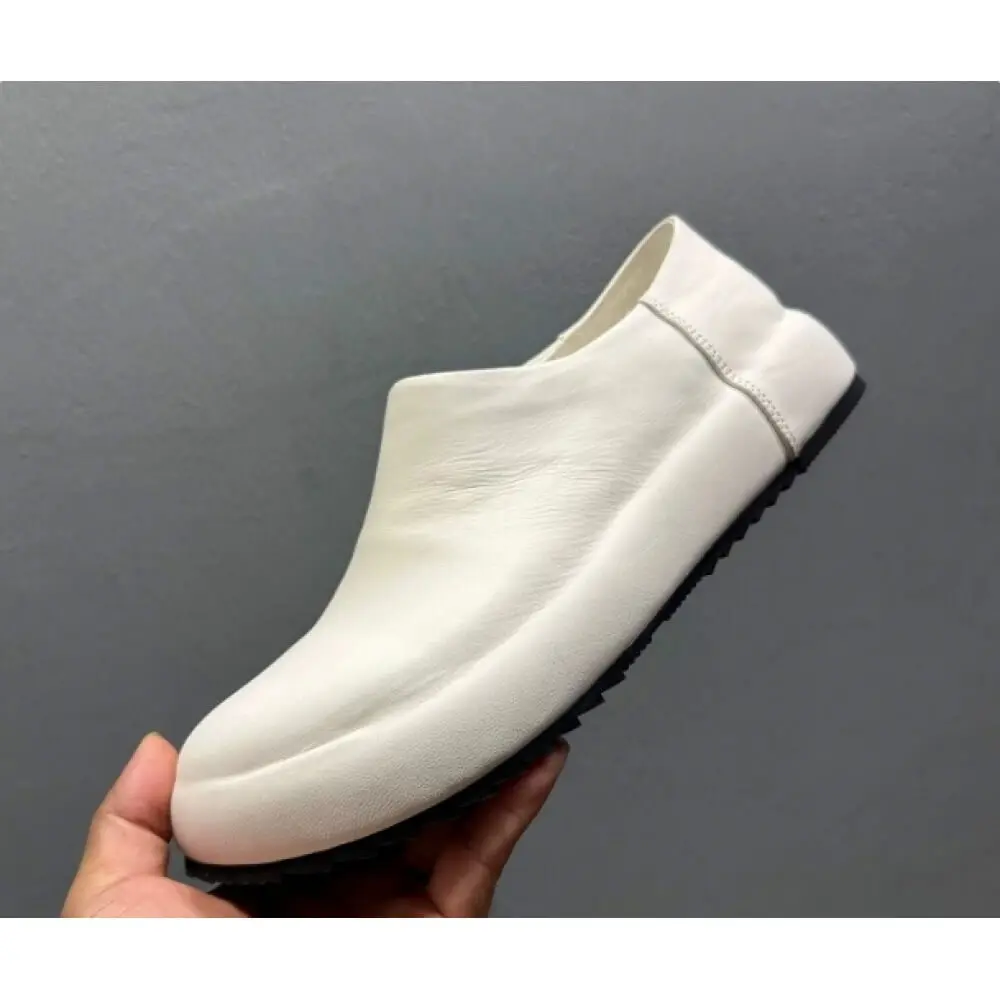 Handcrafted White Leather Chunky Slip-Ons – Superior Craftsmanship, Modern Edgy Appeal