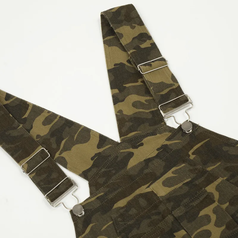 ชุดทํางานสตรีทย้อนยุคสไตล์อเมริกันอินเทรนด์ของผู้ชายหลวมขากว้างกางเกงยีนส์ลายพรางสายสะพายไหล่