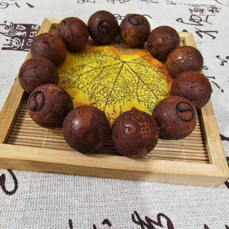 

Natural Black Rosewood Bracelet Carving Twist Qiankun Taiji Ping An Amusement Article Bracelet Hand Toy Buddha Beads20Factory Wh