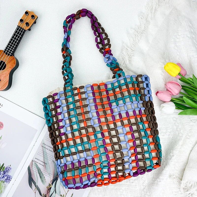 Korean version dark forest bead bag hand woven wooden bead shoulder bag retro niche dark hollow shoulder bag