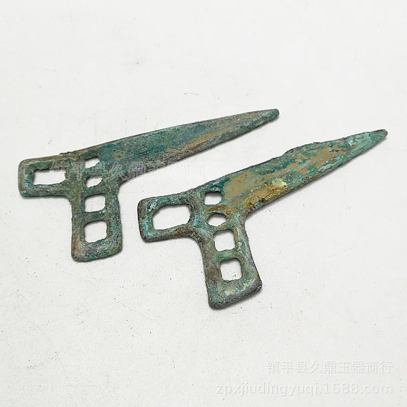 coins, antiques, miscellaneous items, and aged bronze artifacts