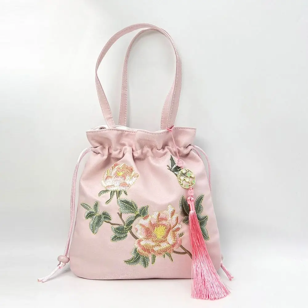 Borsa con coulisse a fiori ricamati in pelle scamosciata fatta a mano elegante manico superiore borsa a secchiello piccola in stile etnico tasca per