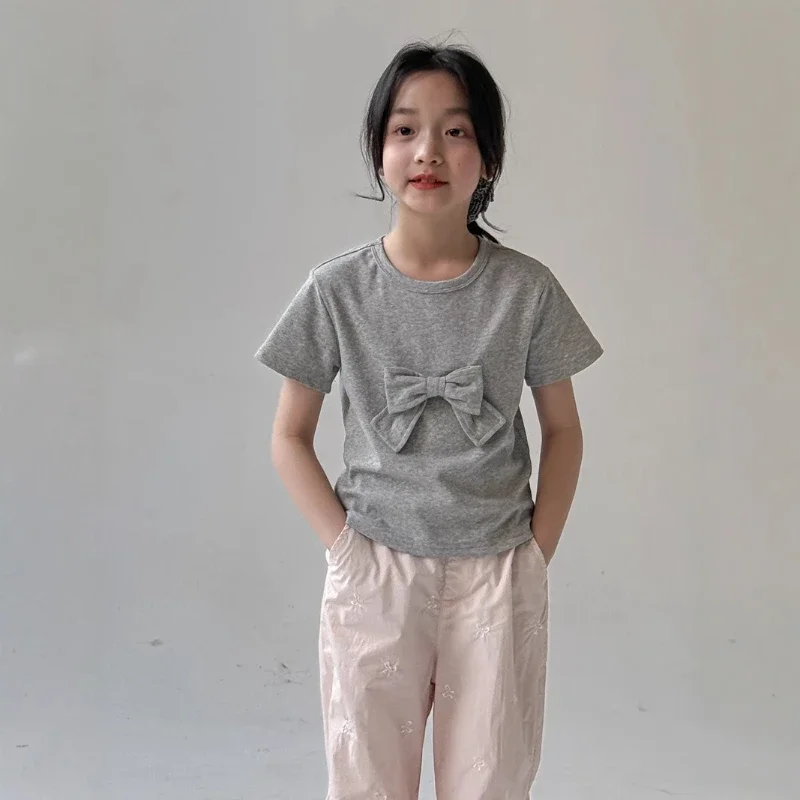 

2025 Summer Mid to Large Children's Solid Color Cotton Sweet Three Dimensional Bow Decorative Short Sleeve Top