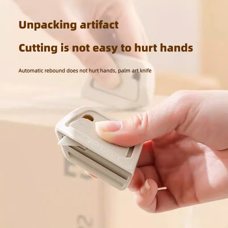 Coupe-boîte à aspiration magnétique, rebond automatique n'endommage pas les mains, le couteau de déballage en céramique est Compact et Portable