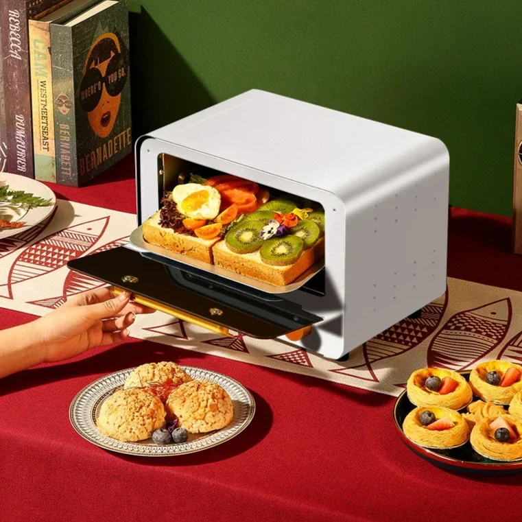 Household electric oven. Multifunctional. Small breakfast machine. Kitchen four-in-one mini oven. Small appliance.