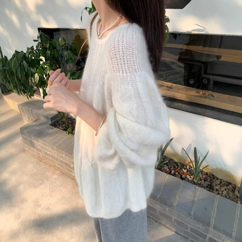 

2025 autumn and winter hollow knitted sweater loose women's sweater top