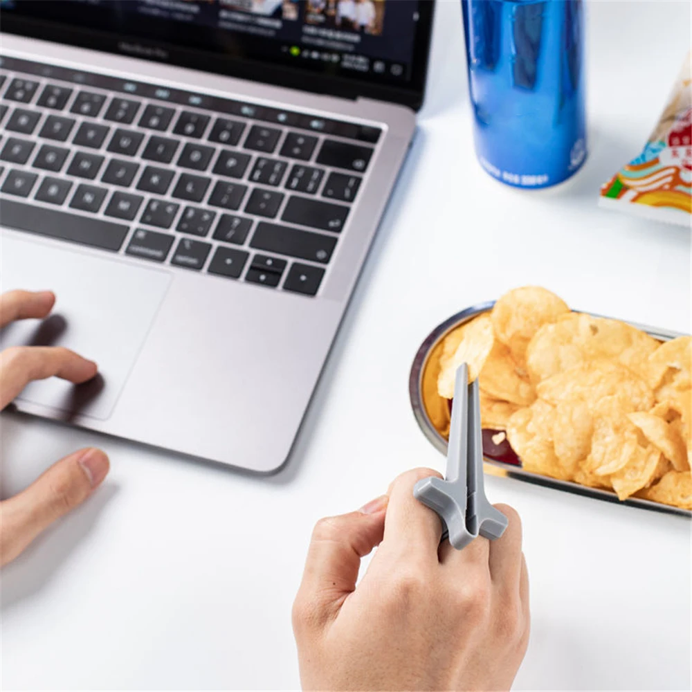 Neue Hand Anti-Schmutz-Spiel Spiele Essstäbchen Telefon Clip Snacks
