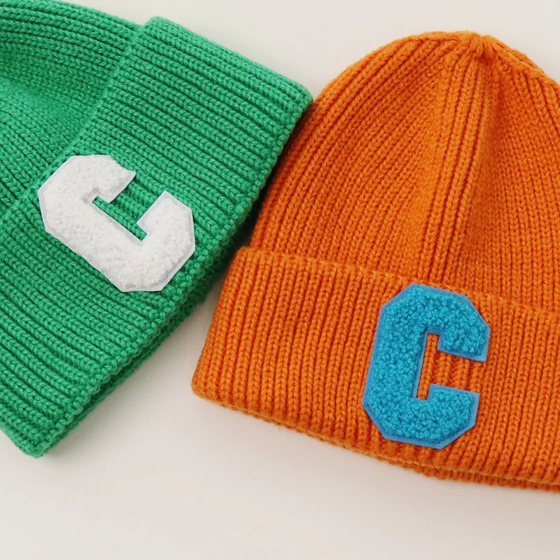 C letter knitted hat Warm boys and girls Korean autumn and winter thickened wool hat candy color simple ear protection hat