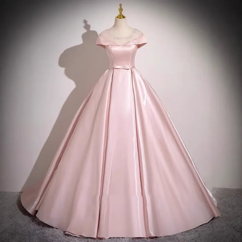 2025 Neues rosafarbenes Satin-Hochzeits-Toast-Braut-Abendkleid, modisches Schlankheits-Bankett-Kleid für Erwachsene, Zeremonie, großes Anhänger-Kleid