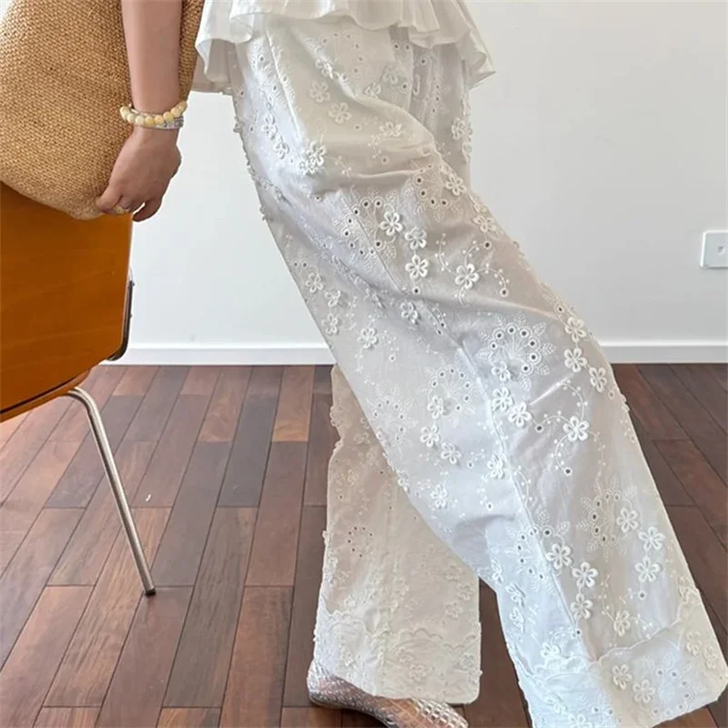 Nuovi pantaloni estivi a gamba larga moda pizzo bianco scava fuori ricamo floreale pantaloni dritti in vita elastica tinta unita da donna