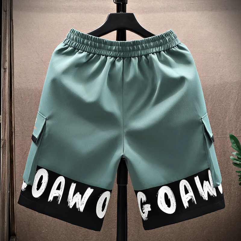 ملابس العمل غير الرسمية orts الرجال الصيف فضفاض مستقيم الساق خمسة أرباع طول العلامة التجارية العصرية في سن المراهقة بناطيل الشواطئ ألياف البوليستر