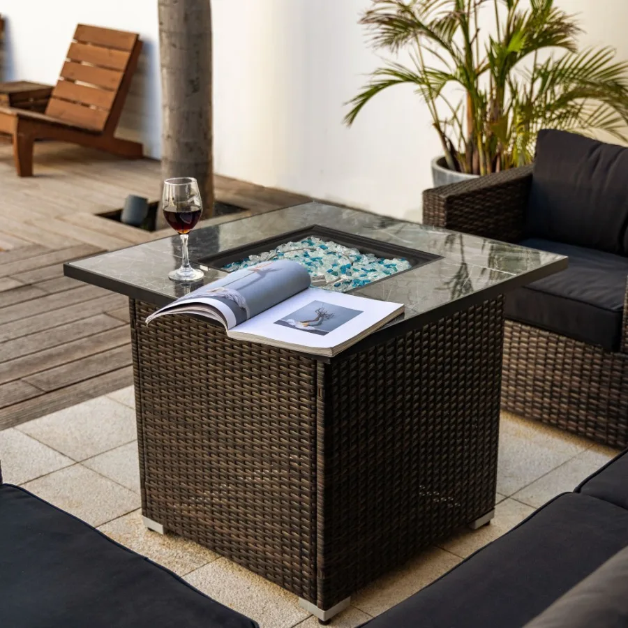 

Outdoor fire table for patio use, stainless steel, black, weather-resistant with propane fuel, glass rocks, lid and rain cover