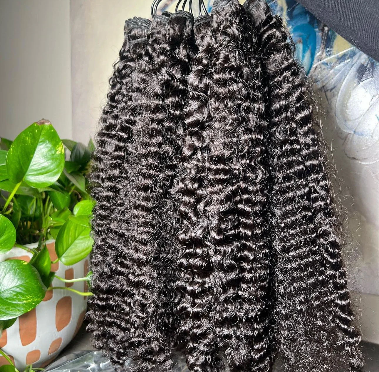 Paquets bouclés birmans cheveux humains vague profonde paquets de cheveux bruts 100% non transformés Double trame Extensions de cheveux armure cheveux bruts