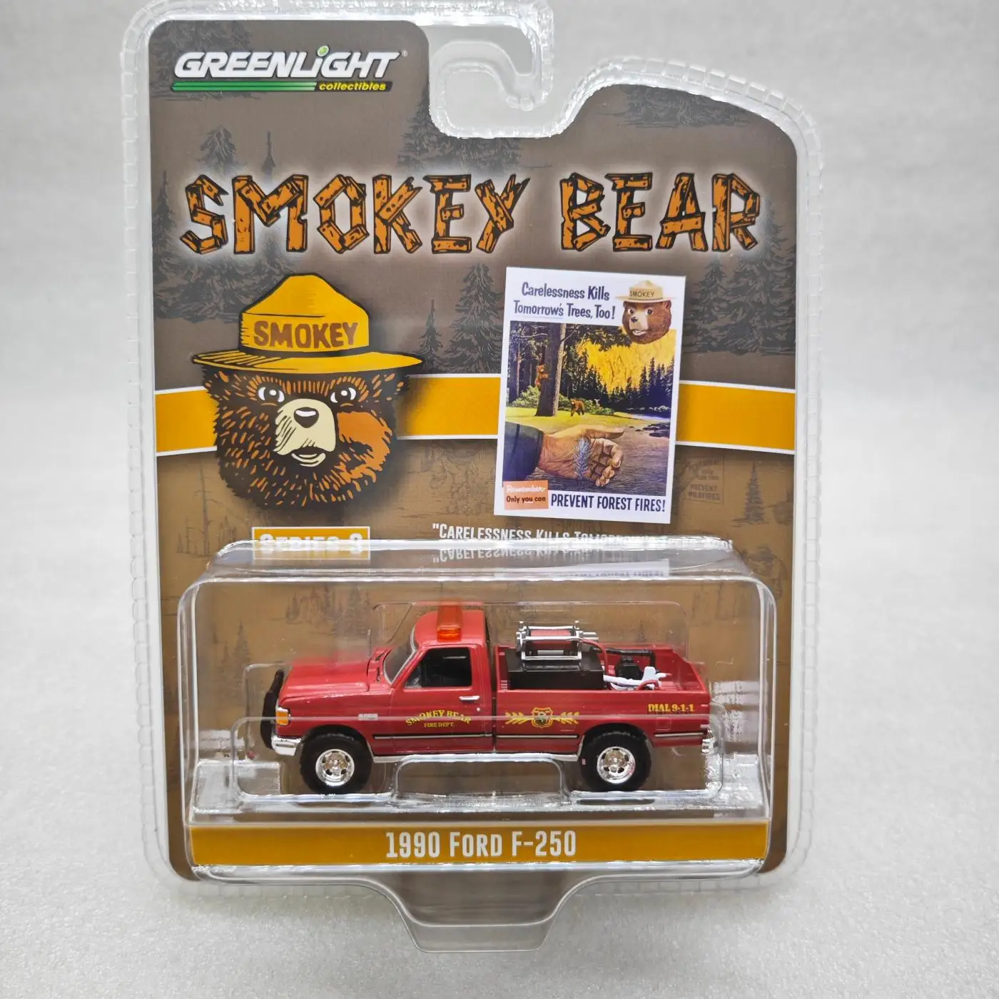 

Green Light 1:64 Smoked Bear Series 3 - 1990 Ford F-250 with Fire Fighting Equipment, Hose and Water Tank Diecast Alloy