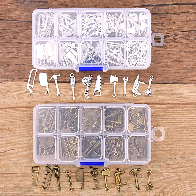 

1Set 100Pcs/Lot 2Color 10Styles Hammer Saw Axe Charm Tool Pendant Kit With Box Material For DIY Jewelry Necklace Bracelet Making