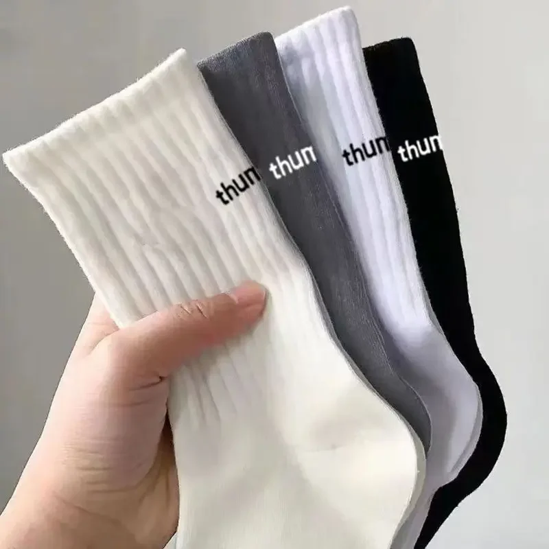 2 pairs of new mid length socks for men in spring, summer, autumn, and winter, sweat breathable sports high tube trendy socks