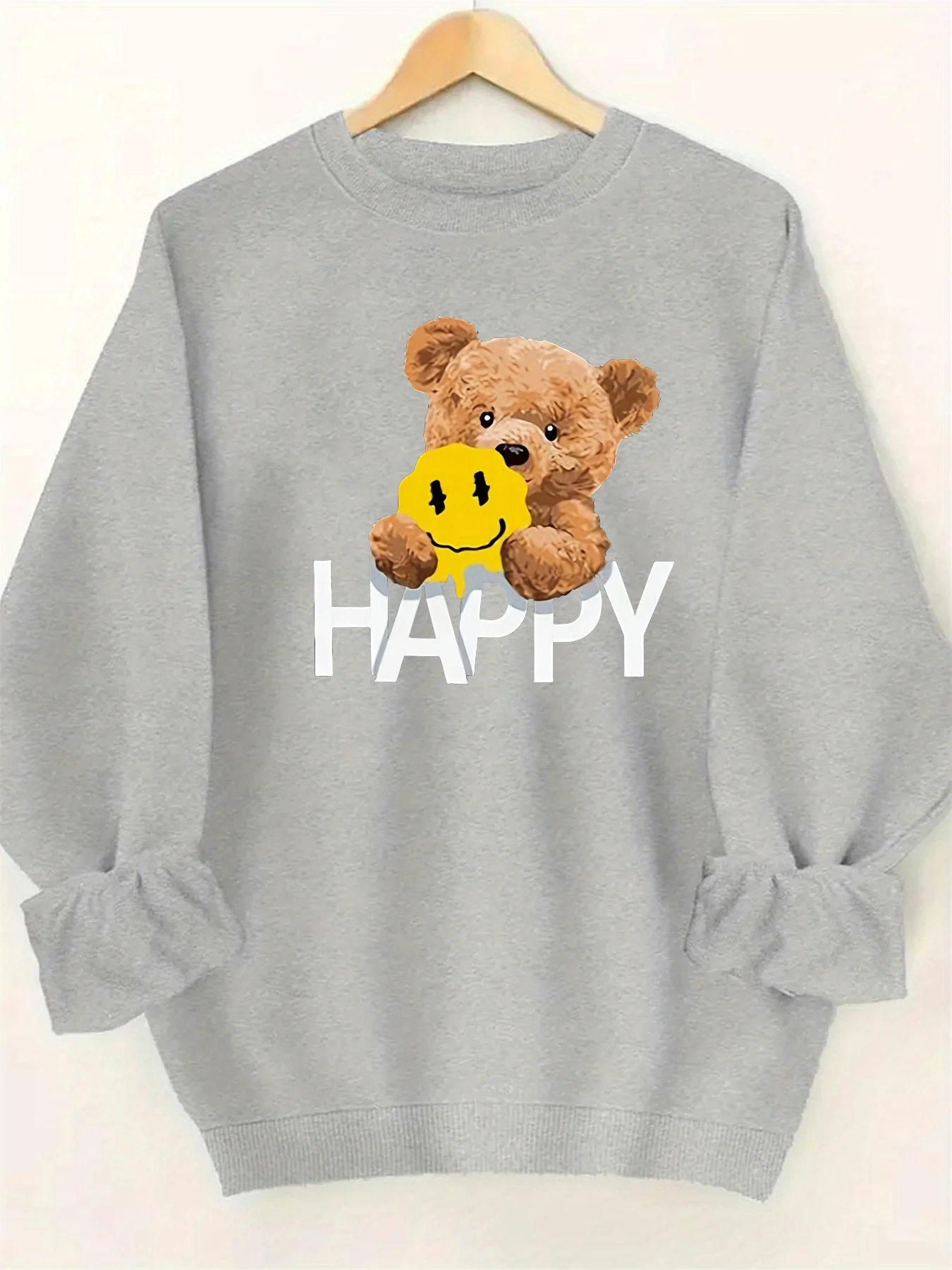 Damska jesienno-zimowa luźna i wygodna ciepła bluza z okrągłym dekoltem, długim rękawem i nadrukiem z motywem misia HAPPY.