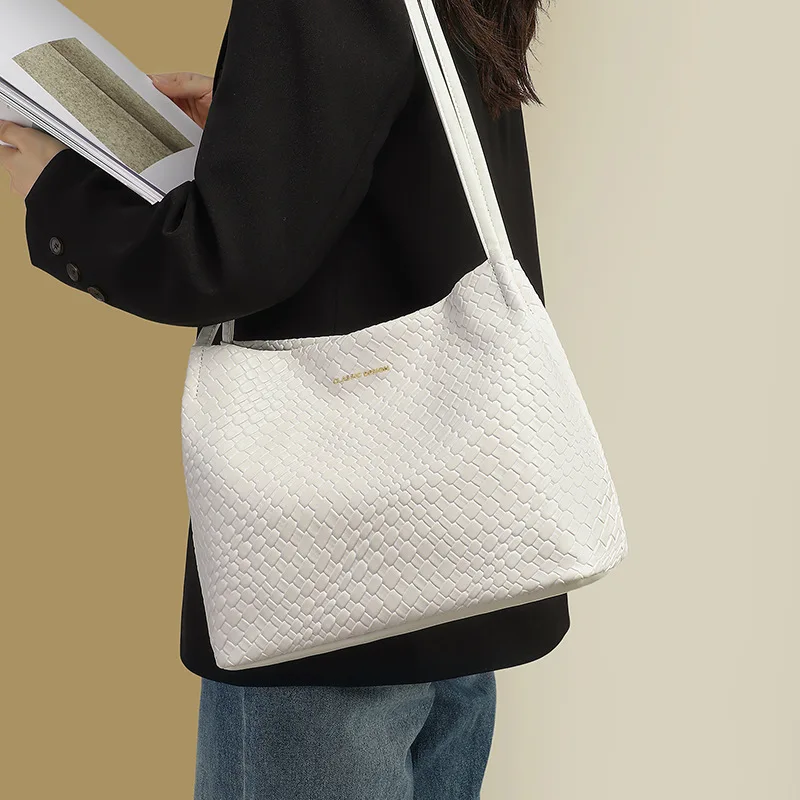 

The best-selling new Korean version of the 2025 women's backpack, a trendy and fashionable woven large-capacity ladies' backpack