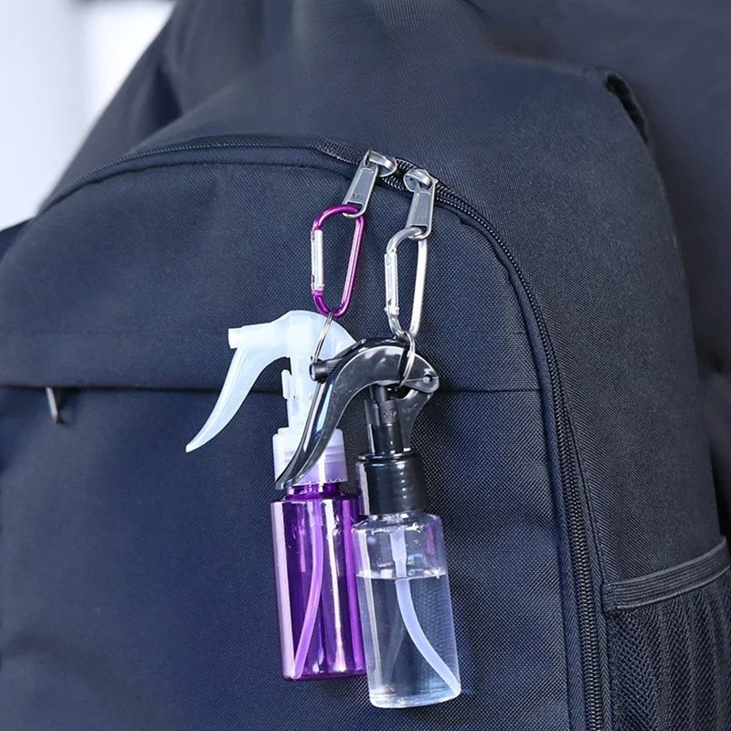60 ml Mini-Reisezubehör mit Karabinerhaken, Make-up-Werkzeug, Lotion-Proben, Unterabfüllung, leerer Behälter, Auslöser, Sprühflaschen