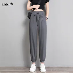 Ice Silk Sports Trousers for Women Summer Thin Loose Fit Drawstring Solid Color Pockets Womens Leisure Time Bloomers Pants