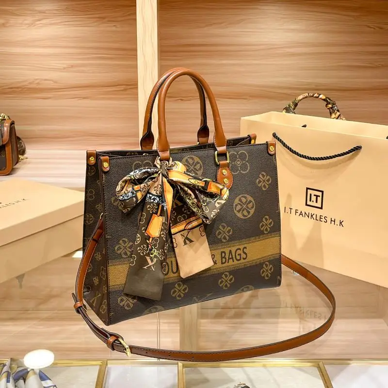 sac-a-main-elegant-en-cuir-veritable-de-marque-hong-kong-nouveau-style-2026-sac-a-bandouliere-unique-pour-femme-sac-fourre-tout-elegant-a-porter-a-la-main