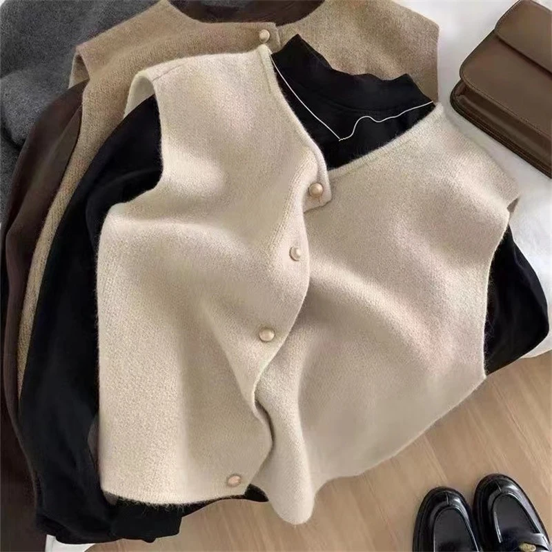 Primavera otoño mujer sólido botón cuello pico sin mangas Casual moda Oficina señora elegante Tops suéter tejido cárdigan chaleco abrigos