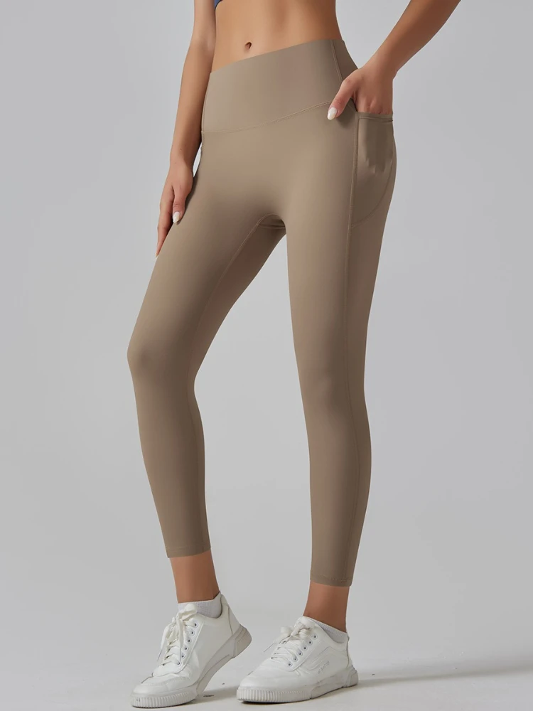 여성 의류 요가 레깅스 스포츠웨어 패션 캐주얼 솔리드 컬러 타이트 바지 여성용 포켓 달리기 피트니스 짐 롱 팬츠
