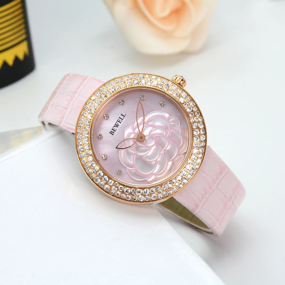 Reloj de mujer de cuarzo de acero inoxidable a la moda con correa de cuero con incrustaciones de diamantes y esfera de flores
