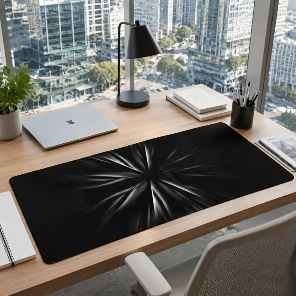 With abstract light burst design, suitable for office workers, gamers and students. Rectangular computer desk mouse pad