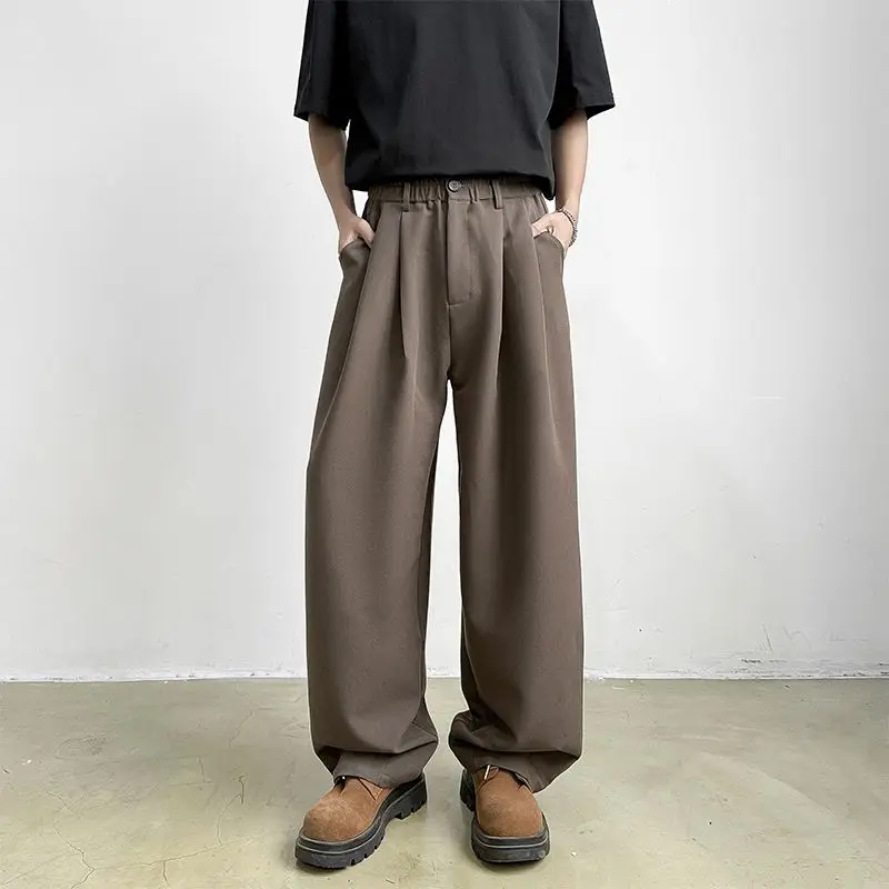 

Ленивые и непринужденные свободные широкие брюки для мужчин летом, новые провисающие брюки в японском стиле, модные повседневные брюки коричневого цвета.