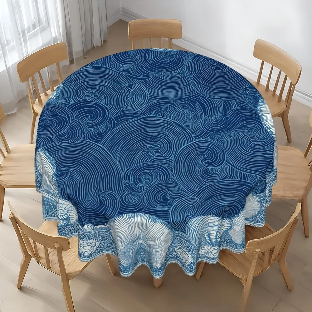 Circular tabletop cover, with a marine-themed design featuring shells and wave patterns in blue and white.