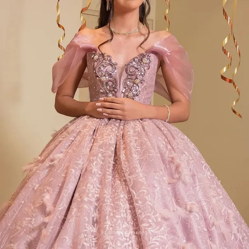 

Shiny Pink Quinceanera Dress off-shoulder crystal decal Long tail feather vestidos de 15 Quinceanera ﻿Customize