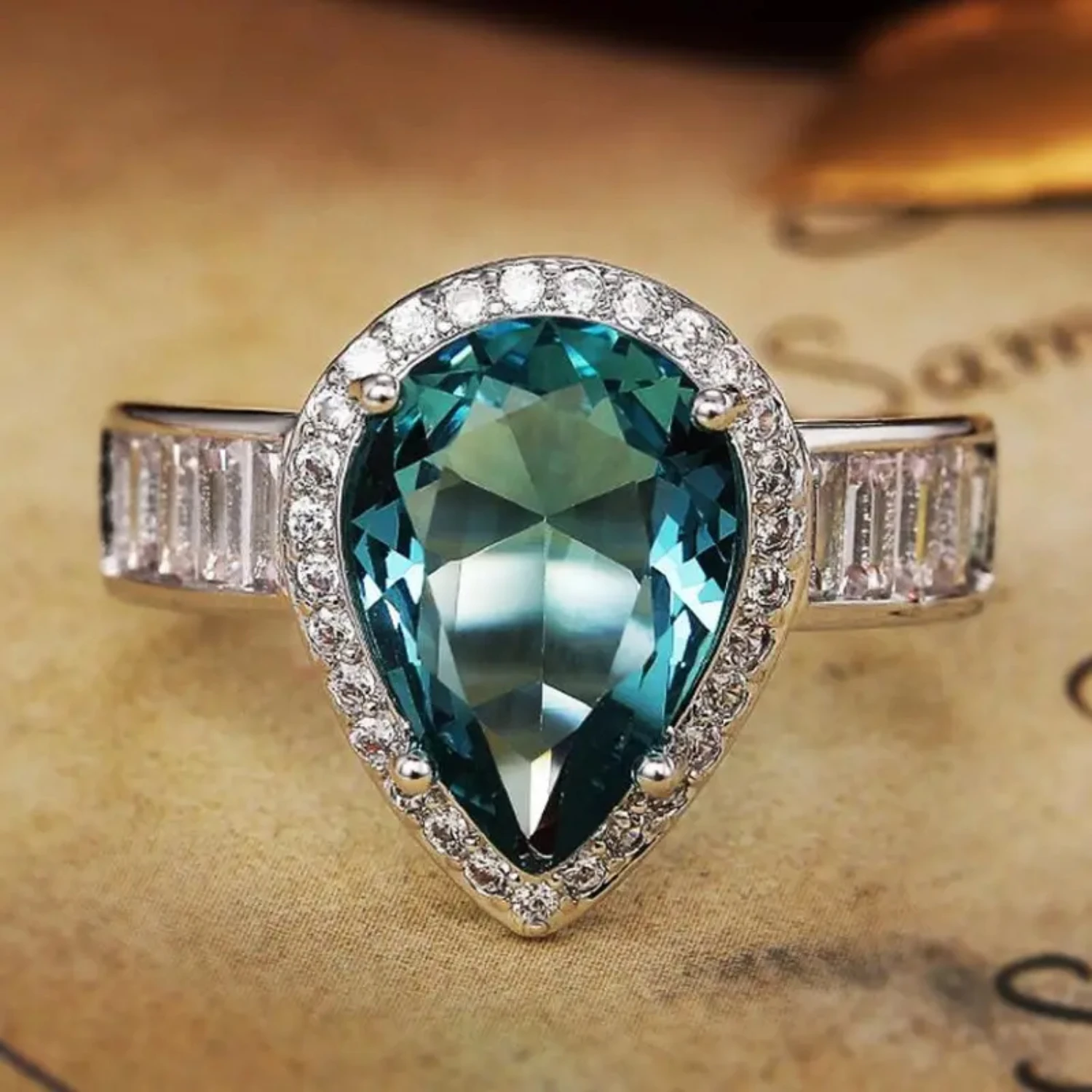 Exquisite and Stunning Water-drop Blue Zircon Engagement Ring with Sparkling Gemstone - Elegant Design for Women's Wedding Band