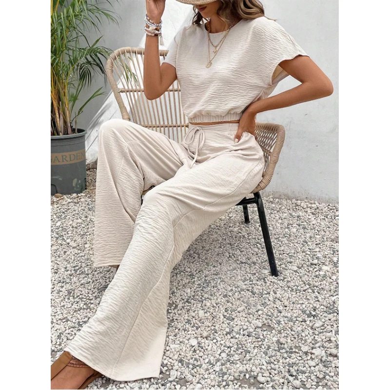 Chic elegante Set di due pezzi per donna Top corto con bottoni sul retro + pantaloni lunghi con coulisse Set completo da donna estivo da donna da