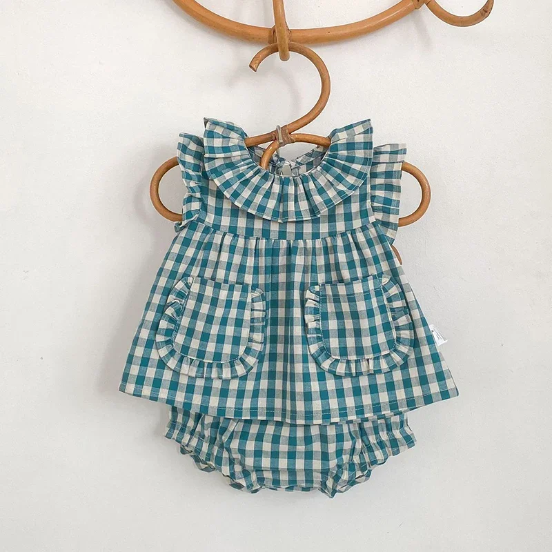 

Новый летний комплект детской одежды 2026 года для девочек 1-4 лет: хлопковая рубашка без рукавов в клетку + шорты-панталоны