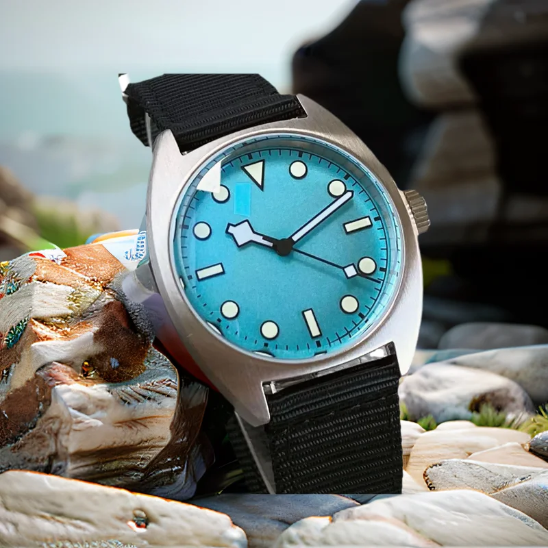 

Стерильные синие автоматические часы для мужчин NH35 Механизм Светящийся циферблат 36 мм 200 м Водонепроницаемые AR Синее покрытие Сапфировое стекло