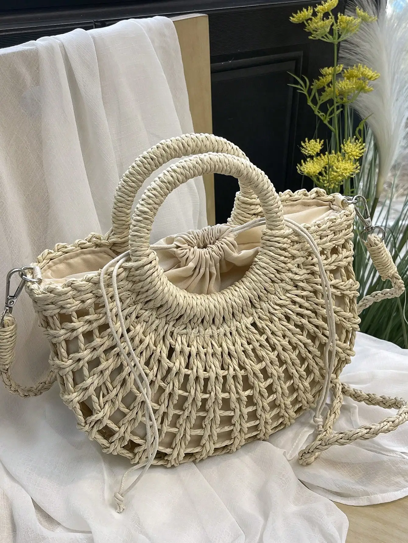 

Cream Woven Straw Half-Moon Top-Handle Bag with Drawstring Closure