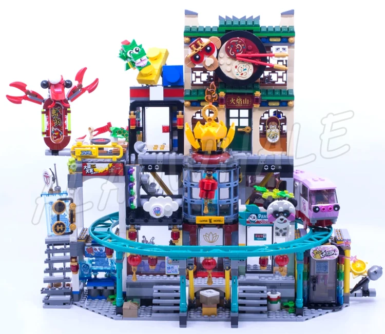 2187pcs Monkie Kid City of Lanterns Lotus Hotels Panda Shops Transit Train 86999 Building Blocks Toys Compatible With Model