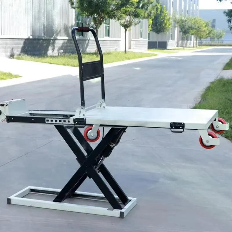 Camion à ciseaux de chariot à main à plat de levage hydraulique électrique pour la manipulation, le chargement et le déchargement embarqués portables