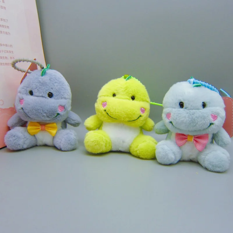 Peluche de dinosaure en forme d'animal de dessin animé, jouet de beurre, pendentif, sac à dos, tentures, ornements, cadeaux