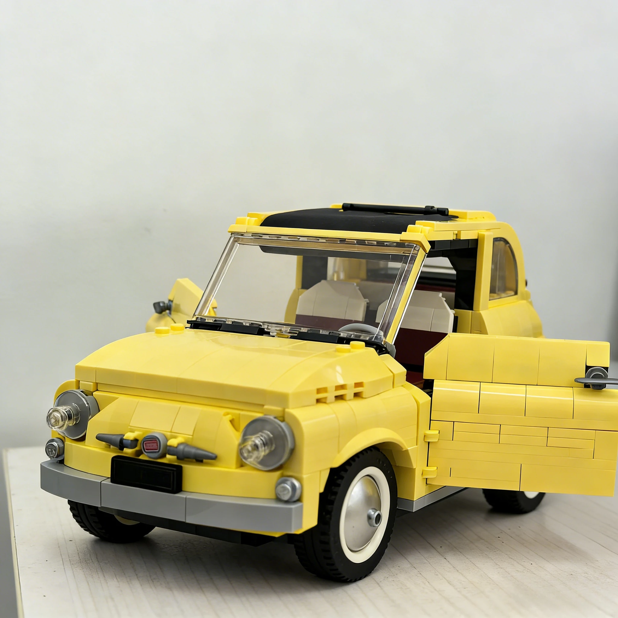 مجموعة مكعبات بناء سيارات المدينة الصفراء 10271 مناسبة لهدايا أعياد الميلاد متوافقة مع قطع ليغو، 960 قطعة.