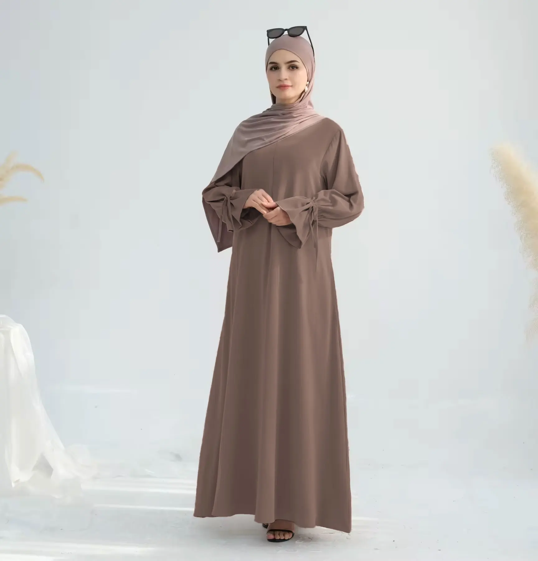 

Elegant Taro Color Muslim Abaya for Women Islamic Soft Cotton Material Drawstring Cuffs Ideal for Middle East UAE Qatar Markets