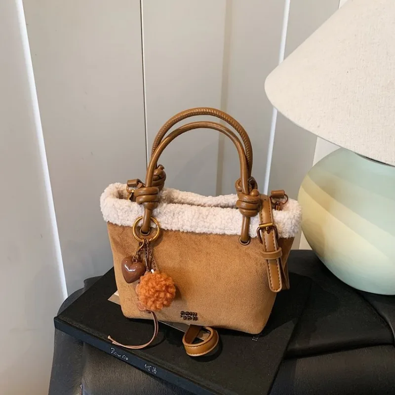 

Luxurious Effortless Diaper Bag Shoulder Baby Trip Commuting Exquisite Glamorous Sophisticated Chic Timeless Functional Parent