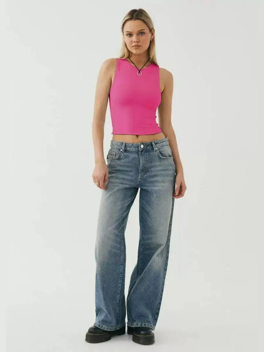 توب نسائي مثير بتصميم Y2K، قصير وضيق بدون أكمام، برقبة مستديرة، ملابس خارجية قصيرة بلون موحد مصنوعة من ألياف ثلاثية الأسيتات