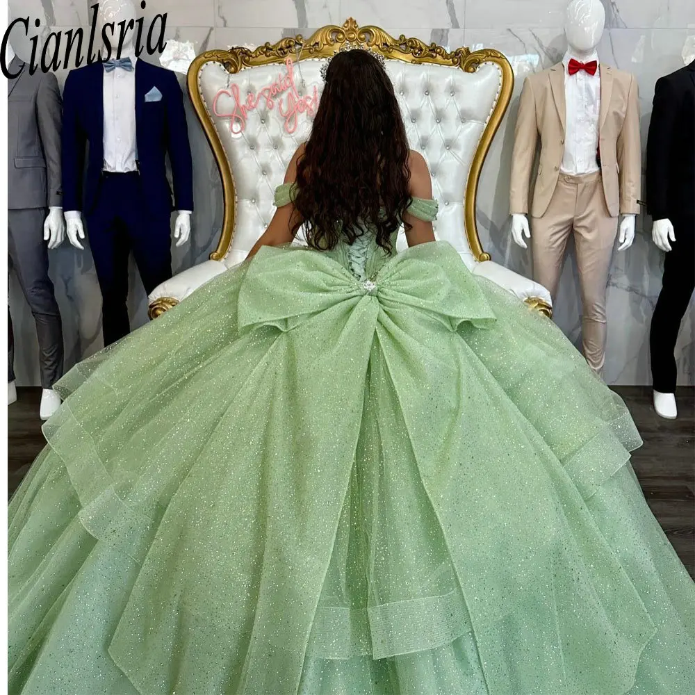 Sage Green Bow Glitter Crystal Ruffles Ball Gown Quinceanera Dresses Off The Shoulder Beading Pleat Corset Vestido De 15 Anos