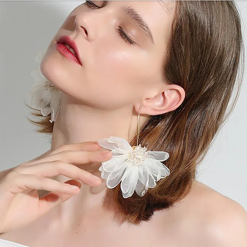 

Party holiday elegant wind fairy cloth art big flower flower earrings pendant female Korean temperament fresh earrings
