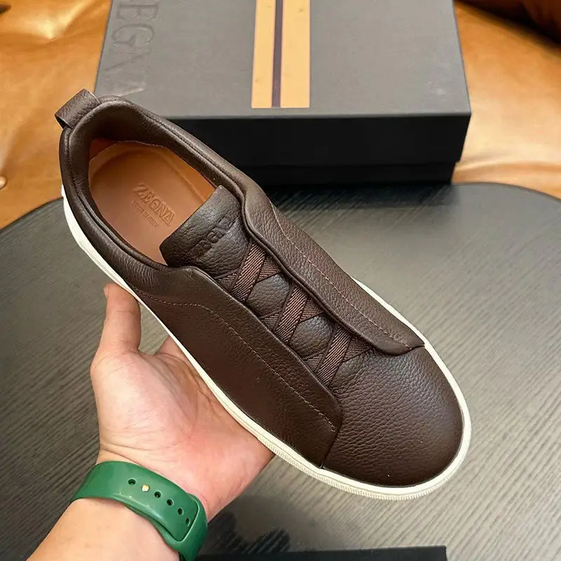 

Luxury high-end leather men's shoes one-pedal low-top board shoes cross elastic band casual sports shoes lazy foot